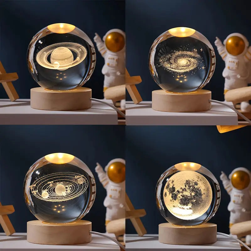 "Crystal ball with moon phase design glowing on dark stand"
